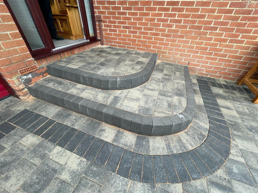 Curved bullnose steps in charcoal block — The Vale Company
