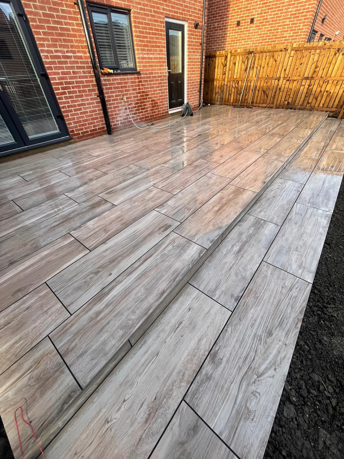 Wood-effect porcelain step detail with a clean nosing and open joints — The Vale Company