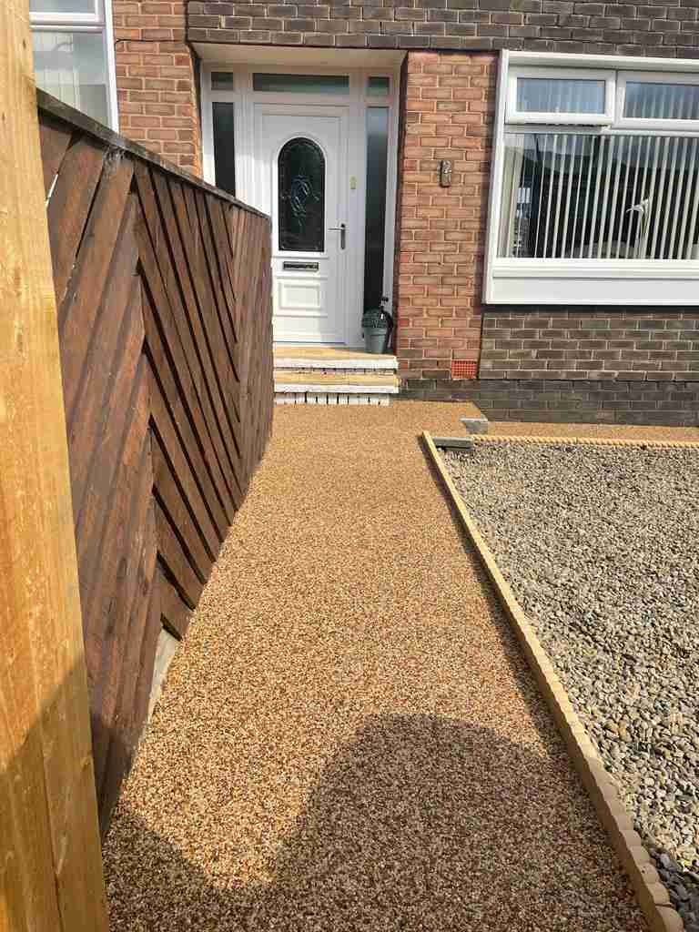 After: gold resin bound front path laid alongside a retained gravel bed — The Vale Company