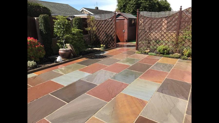 Autumn multi-tone Indian sandstone patio laid to a square pattern — The Vale Company